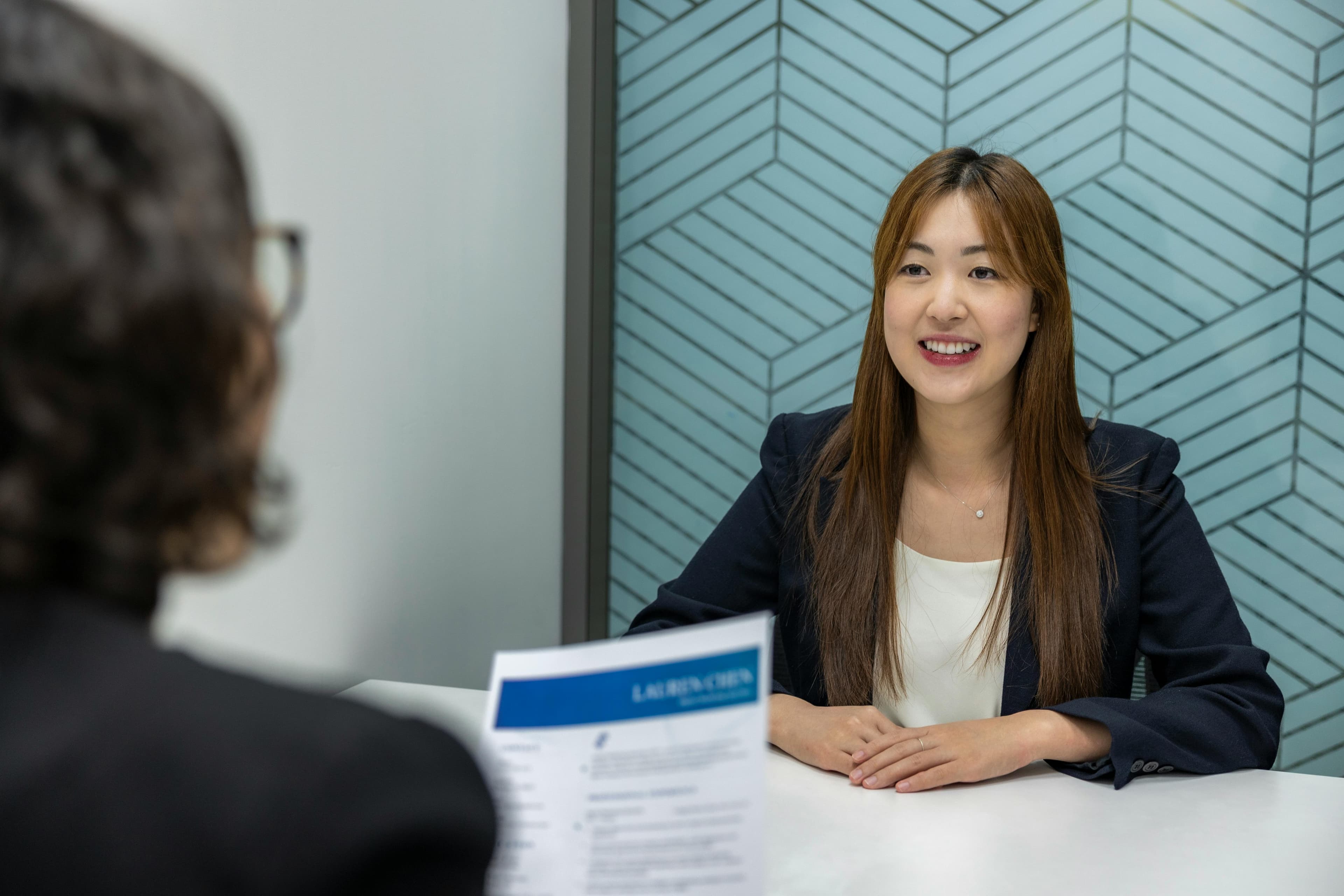 Professional reviewing AI-assisted career guidance.